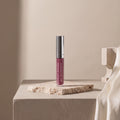Colorescience Peptide Lip Shine SPF 30 Plum studio still life