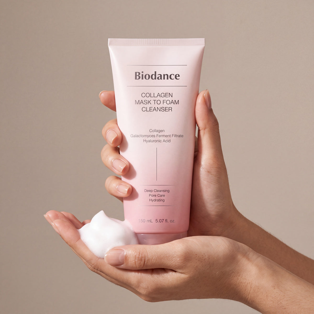 Biodance Collagen Mask to Foam Cleanser held in hands, editorial studio shot