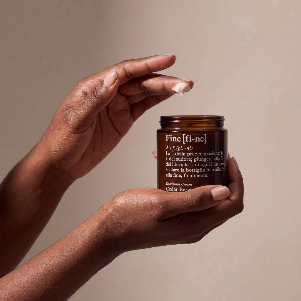 Fi-ne Cedar Bergamot – Deodorant Cream held in hands, editorial studio shot
