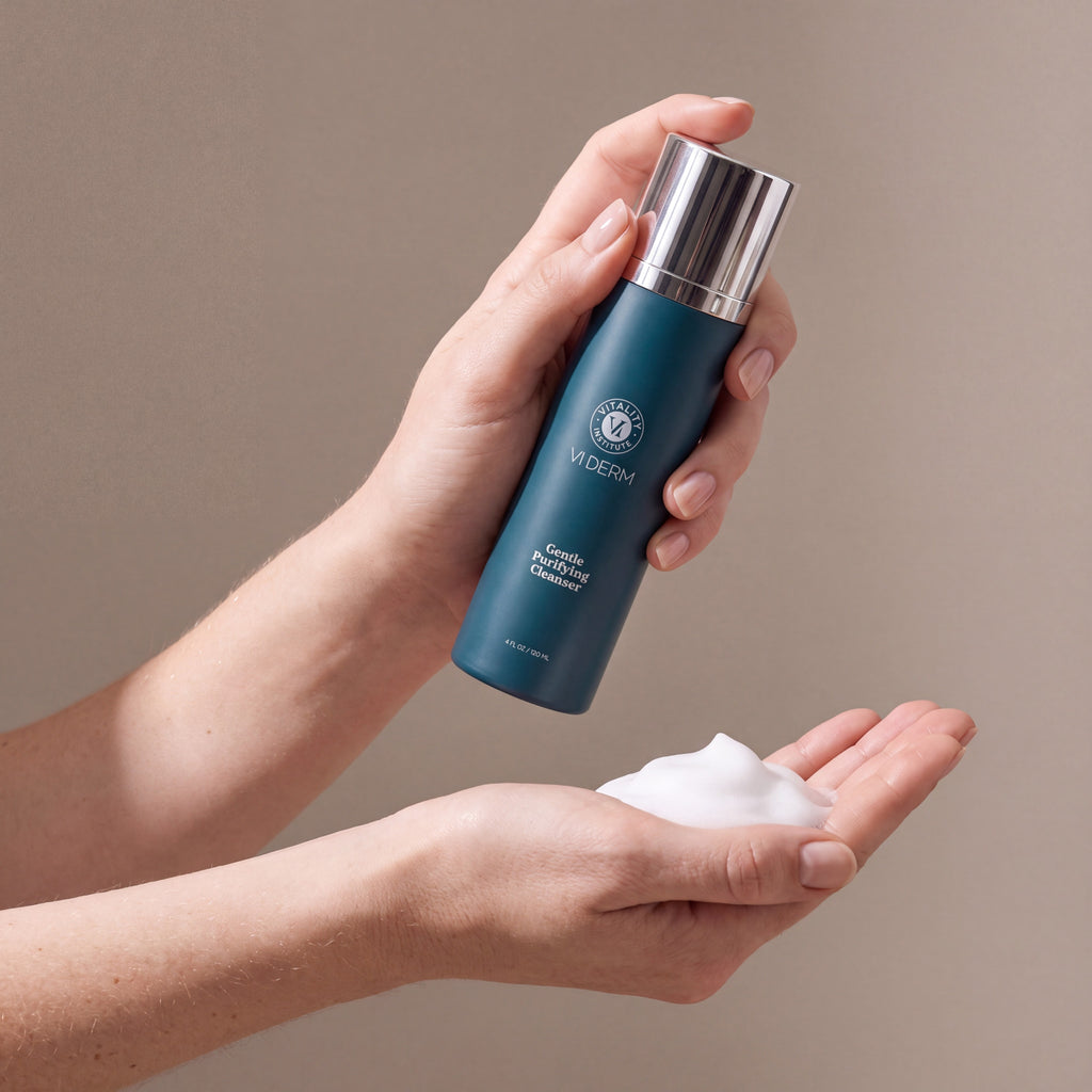 VI DERM Gentle Purifying Cleanser held in hands, editorial studio shot