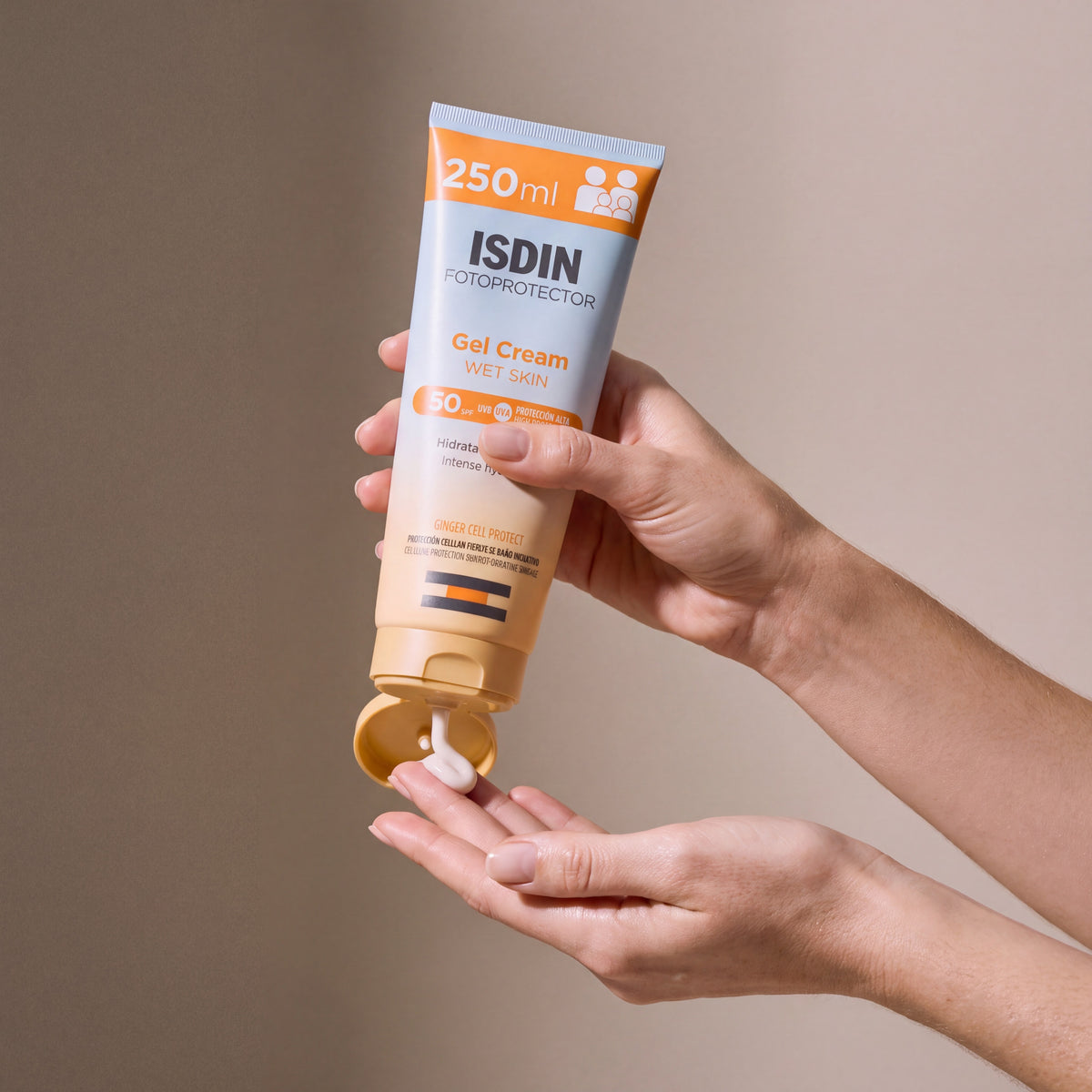 Isdin Gel Cream SPF 50 held in hands, editorial studio shot