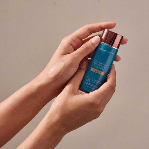 Colorescience Flex SPF Light held in hands, editorial studio shot
