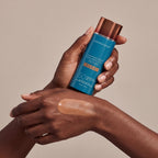 Colorescience Flex SPF Rich Deep held in hands, editorial studio shot