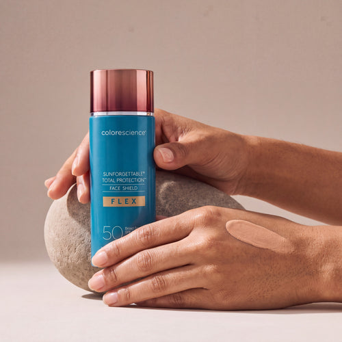 Colorescience Flex SPF Medium held in hands, editorial studio shot