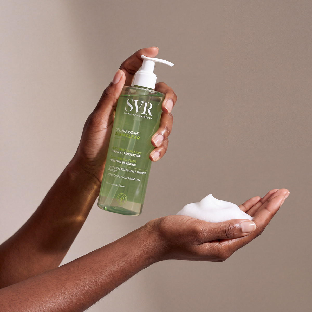 SVR Gel Moussant held in hands, editorial studio shot