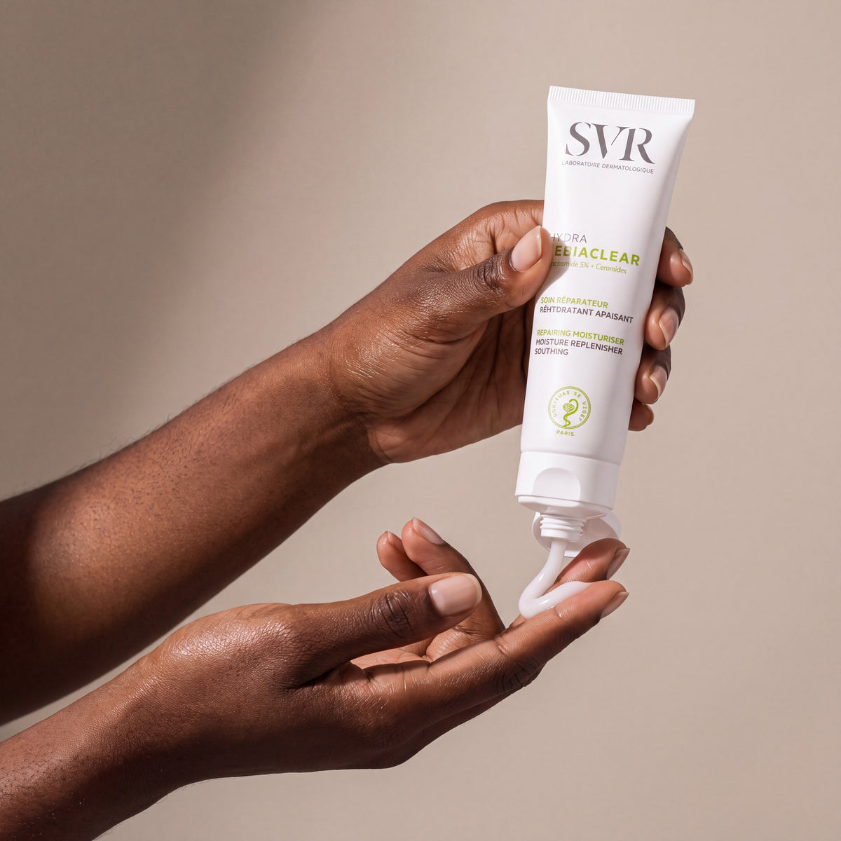 SVR Sebiaclear Hydra held in hands, editorial studio shot