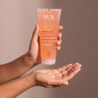 SVR Gel Lavant held in hands, editorial studio shot