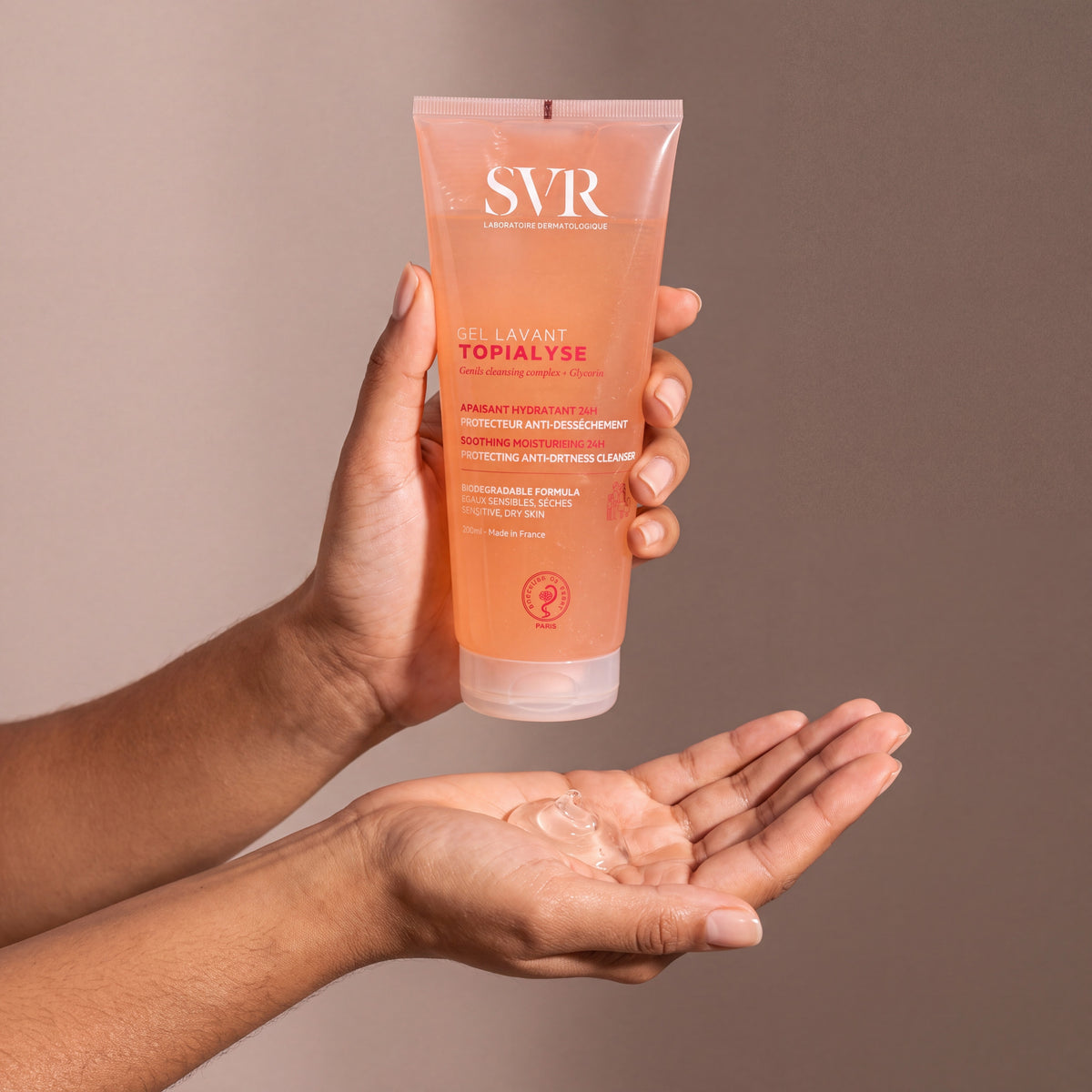 SVR Gel Lavant held in hands, editorial studio shot