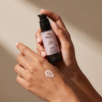 SUNSKIN Tinted Face Sunscreen SPF50 held in hands, editorial studio shot