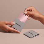 Stainless Steel Card Makeup Mirror in hands, editorial studio shot